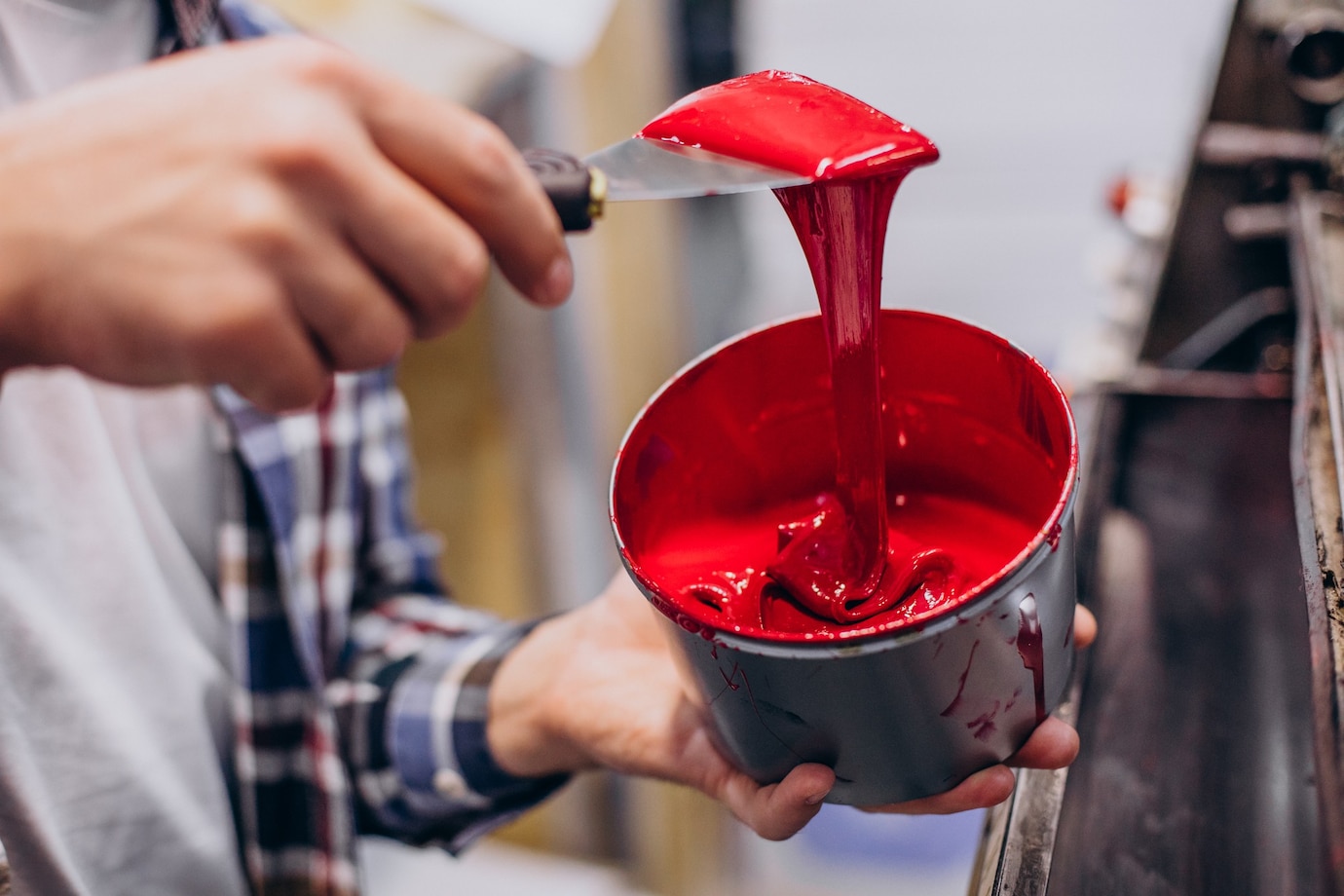 man-working-printing-house-with-paper-paints